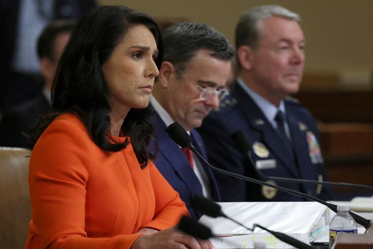 FILE PHOTO: Director of National Intelligence (DNI) Tulsi Gabbard, CIA Director John Ratcliffe and U.S. Air Force Lt. General and Director of the Defense Intelligence Agency (DIA) Jeffrey Kruse attend a House Intelligence Committee hearing about worldwide threats, on Capitol Hill in Washington, D.C., U.S., March 26, 2025. REUTERS/Leah Millis/File Photo