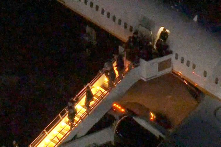 Venezuela's President Nicolas Maduro is led in custody from a U.S. federal airplane before his scheduled court appearance at Manhattan federal court, at Stewart Air National Guard Base in Newburgh, New York, U.S. January 3, 2026.  ABC Affiliate WABC via REUTERS 
NO RESALES. NO ARCHIVES. THIS IMAGE HAS BEEN SUPPLIED BY A THIRD PARTY. MANDATORY CREDIT