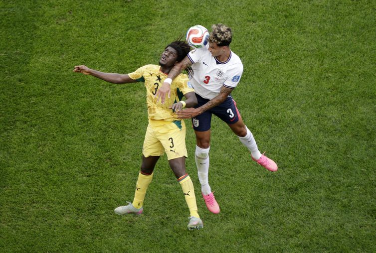 Soccer Football - FIFA World Cup 2026 - Group L - England v Ghana - Boston Stadium, Foxborough, Massachusetts, U.S. - June 23, 2026 Ghana's Caleb Yirenkyi in action with England's Nico O'Reilly REUTERS/Pilar Olivares